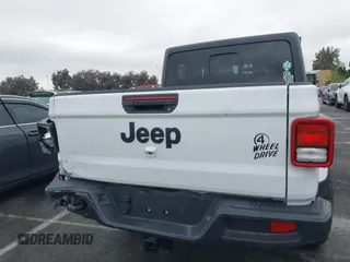 2022 Jeep Gladiator Willys with VIN 1C6HJTAG1NL148524, listed as a IAAI auction lot 41507693 with 42,004 mi miles and . Bid and sale history available at DreamBid. Image 16.