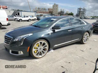 2018 Cadillac XTS Luxury z VIN 2G61M5S30J9135292, wystawiony jako Copart lot #57121115 z przebiegiem 95 110 mil mil oraz Szkoda całkowita • Salvage title. Historia ofert i sprzedaży dostępna na DreamBid. Obrazek 1.