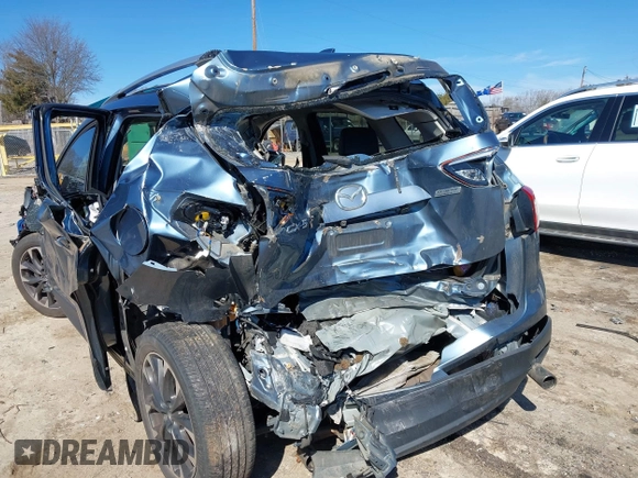 2016 Mazda CX-5 Grand Touring with VIN JM3KE2DY2G0715272, listed as a IAAI auction lot 41590492 with 134,176 mi miles. Bid and sale history available at carsss.com. Image 6.