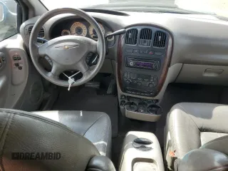 2001 Chrysler Town & Country LXi with VIN 2C4GP54L11R176042, listed as a Copart auction lot 69045254 with 217,421 mi miles and Salvage Title. Bid and sale history available at DreamBid. Image 8.