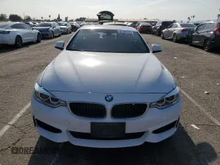 2015 BMW 4 Series 428i with VIN WBA4A9C59FGL87249, listed as a Copart auction lot 52182775 with 57,797 mi miles and Salvage title. Bid and sale history available at DreamBid. Image 5.