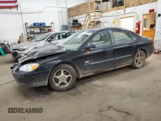 2003 Ford Taurus SEL Deluxe with VIN 1FAHP56S43A219925, listed as a Copart auction lot 76978824 with 191,000 mi miles and Salvage Title. Bid and sale history available at DreamBid. Image 1.