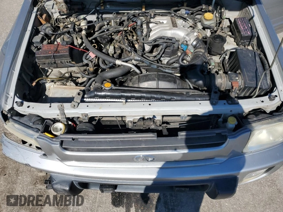 2000 Infiniti QX4 with VIN JNRAR07Y1YW077992, listed as a Copart auction lot 45572015 with 202,385 mi miles and Salvage Title. Bid and sale history available at DreamBid. Image 12.