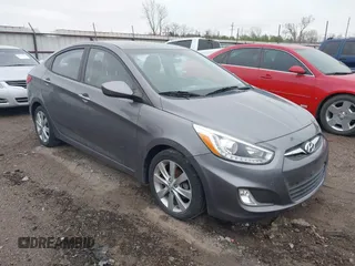 2014 Hyundai Accent GLS with VIN KMHCU4AE1EU771775, listed as a IAAI auction lot 41893787 with 98,011 mi miles. Bid and sale history available at carsss.com. Image 1.