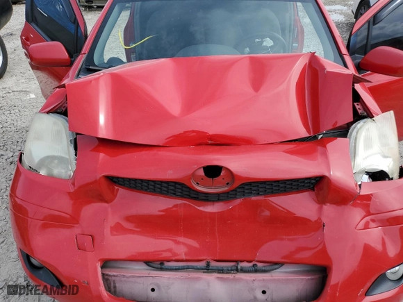 2009 Toyota Yaris with VIN JTDJT903395222185, listed as a Copart auction lot 51340875 with 178,490 mi miles and Salvage Title. Bid and sale history available at carsss.com. Image 11.