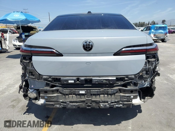 2023 BMW 7 Series 740i with VIN WBA23EH05PCM61539, listed as a Copart auction lot 58013225 with 16,242 mi miles and Salvage title. Bid and sale history available at DreamBid. Image 6.