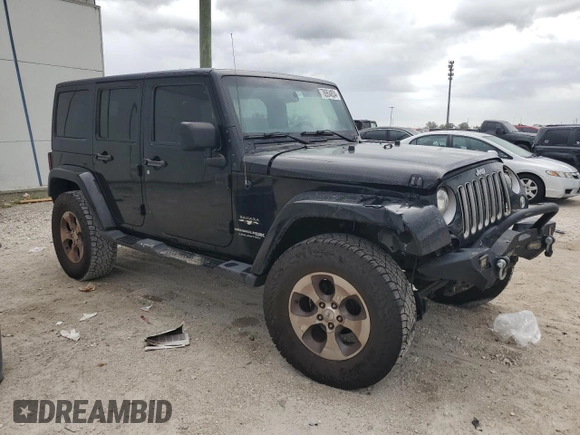 2018 Jeep Wrangler JK Unlimited Sahara with VIN 1C4BJWEG8JL908646, listed as a Copart auction lot 78954834 with 200,857 mi miles and Salvage Title. Bid and sale history available at carsss.com. Image 4.