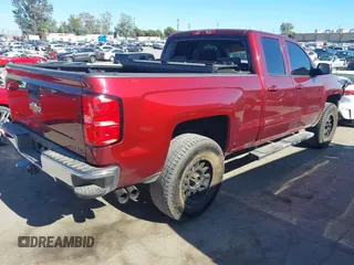 2017 Chevrolet Silverado 1500 LT with VIN 1GCRCREC0HZ171084, listed as a IAAI auction lot 40142848 with 137,420 mi miles and . Bid and sale history available at DreamBid. Image 4.