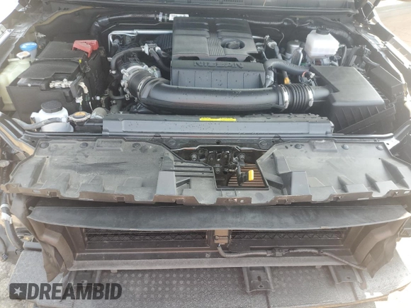 2024 Nissan Frontier SV with VIN 1N6ED1FKXRN605620, listed as a Copart auction lot 59854695 with 8,828 mi miles and Salvage title. Bid and sale history available at DreamBid. Image 11.