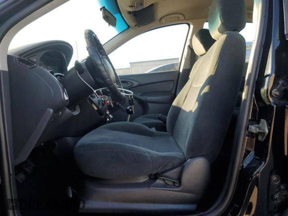 2000 Ford Focus LX with VIN 1FAFP33P8YW216936, listed as a Copart auction lot 83038404 with 120,298 mi miles and Salvage Title. Bid and sale history available at DreamBid. Image 7.