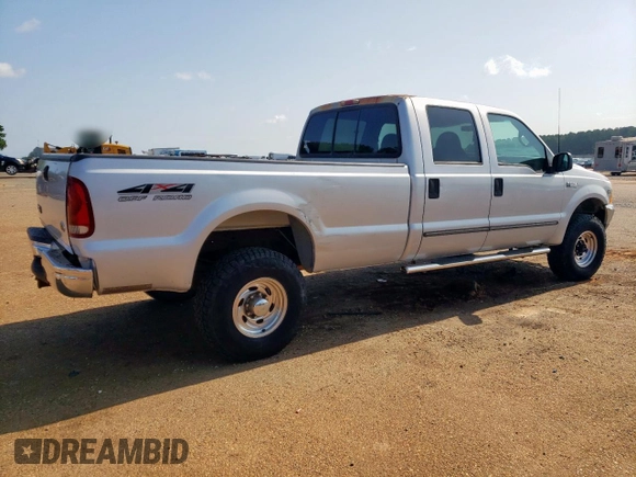 1999 Ford F-350 XL with VIN 1FTSW31S2XEE89071, listed as a Copart auction lot 61016685 with 115,130 mi miles and Salvage title. Bid and sale history available at DreamBid. Image 3.