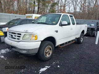 2003 Ford F-150 XL with VIN 1FTRX18W43NB84285, listed as a IAAI auction lot 41494919 with 197,352 mi miles. Bid and sale history available at carsss.com. Image 2.