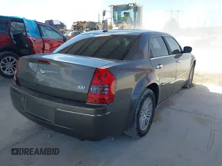 2010 Chrysler 300 Touring with VIN 2C3CA5CV5AH233033, listed as a IAAI auction lot 42130676 with 158,323 mi miles and . Bid and sale history available at DreamBid. Image 4.
