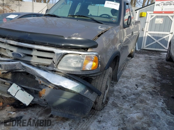 2003 Ford F-150 XL with VIN 2FTRX18W73CB07559, listed as a IAAI auction lot 41452402 with 152,509 mi miles. Bid and sale history available at carsss.com. Image 12.