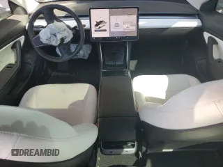 2019 Tesla Model 3 Long Range with VIN 5YJ3E1EB3KF513035, listed as a Copart auction lot 49527535 with 65,880 mi miles and Salvage Title. Bid and sale history available at DreamBid. Image 8.
