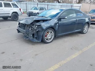 2009 Scion tC with VIN JTKDE167690288903, listed as a IAAI auction lot 41925192 with 220,905 mi miles. Bid and sale history available at carsss.com. Image 2.
