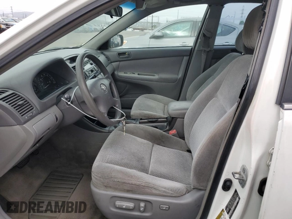 2004 Toyota Camry LE with VIN 4T1BE32KX4U379593, listed as a Copart auction lot 53391455 with 221,056 mi miles and Salvage Title. Bid and sale history available at carsss.com. Image 7.