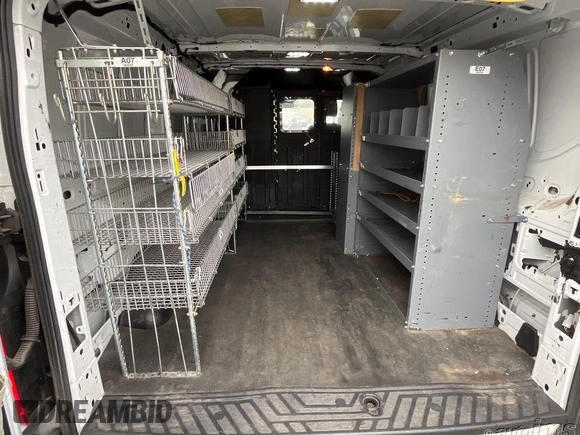 2016 Ford Transit Cargo with VIN 1FTYE1YM9GKB19536, listed as a IAAI auction lot 42219052 with 121,978 mi miles. Bid and sale history available at carsss.com. Image 1.