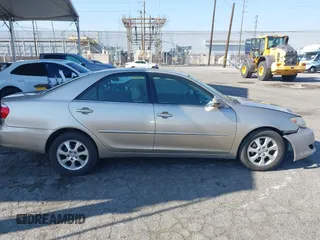 2005 Toyota Camry LE with VIN 4T1BF32K55U592479, listed as a IAAI auction lot 41974250 with 184,767 mi miles and . Bid and sale history available at DreamBid. Image 13.