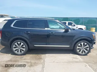 2021 Kia Telluride S with VIN 5XYP64HC9MG177780, listed as a IAAI auction lot 42510581 with 55,900 mi miles and . Bid and sale history available at DreamBid. Image 14.
