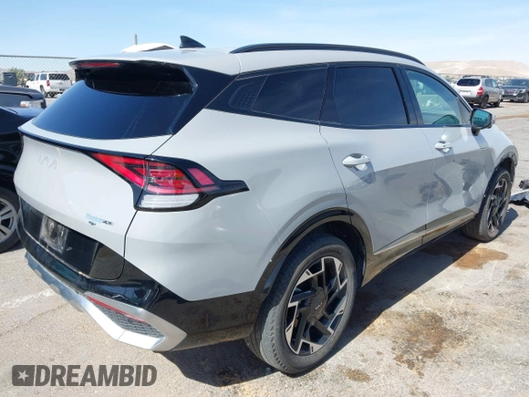 2024 Kia Sportage SX-Prestige with VIN 5XYK5CDF1RG143931, listed as a IAAI auction lot 42236962 with 23,461 mi miles and . Bid and sale history available at DreamBid. Image 4.