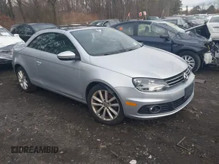 2012 Volkswagen Eos Komfort with VIN WVWBW7AH5CV006923, listed as a IAAI auction lot 41751169 with 99,394 mi miles and . Bid and sale history available at DreamBid. Image 1.