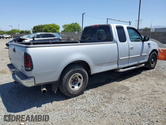 2001 Ford F-150 XL with VIN 1FTRX17W11NA24623, listed as a Copart auction lot 56767345 with 201,959 mi miles and Salvage title. Bid and sale history available at DreamBid. Image 3.