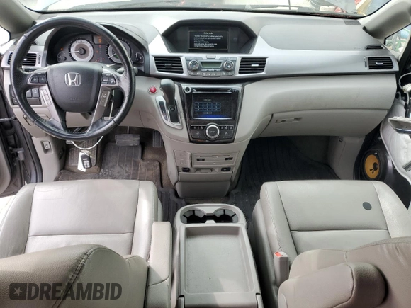 2014 Honda Odyssey Touring z VIN 5FNRL5H91EB121062, wystawiony jako Copart lot #53546515 z przebiegiem 192 136 mil mil oraz Szkoda całkowita • Salvage title. Historia ofert i sprzedaży dostępna na DreamBid. Obrazek 8.