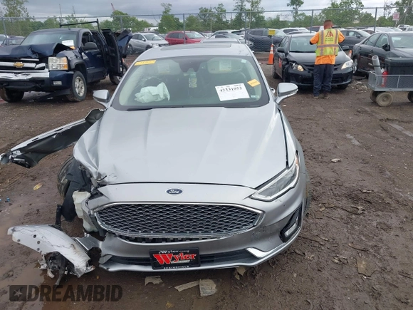 2020 Ford Fusion Titanium with VIN 3FA6P0D98LR115437, listed as a IAAI auction lot 42331052 with 127,346 mi miles and . Bid and sale history available at DreamBid. Image 12.