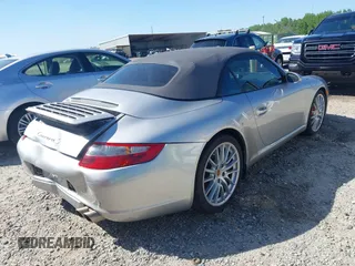 2006 Porsche 911 Carrera S z VIN WP0CB29976S766616, wystawiony jako IAAI lot #42119525 z przebiegiem 57 164 mil mil oraz . Historia ofert i sprzedaży dostępna na DreamBid. Obrazek 4.