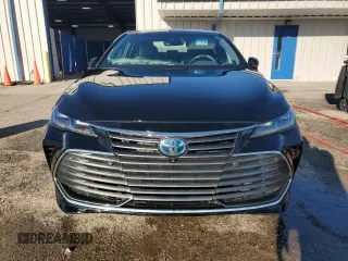 2019 Toyota Avalon Limited Hybrid z VIN 4T1B21FB3KU008344, wystawiony jako Copart lot #84662964 z przebiegiem 127 254 mil mil oraz Szkoda całkowita • Salvage title. Historia ofert i sprzedaży dostępna na DreamBid. Obrazek 5.