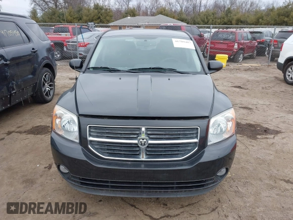2011 Dodge Caliber Heat with VIN 1B3CB5HA7BD110672, listed as a IAAI auction lot 41709487 with 59,679 mi miles and . Bid and sale history available at DreamBid. Image 12.
