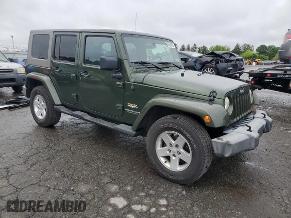 2007 Jeep Wrangler Unlimited Sahara z VIN 1J4GA59127L106988, wystawiony jako Copart lot #59750975 z przebiegiem 154 233 mil mil oraz Czysty tytuł • Clean title. Historia ofert i sprzedaży dostępna na DreamBid. Obrazek 4.
