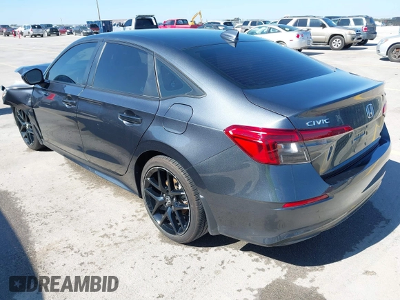 2022 Honda Civic Sedan Sport with VIN 2HGFE2F58NH597686, listed as a IAAI auction lot 41489050 with 44,161 mi miles. Bid and sale history available at carsss.com. Image 3.