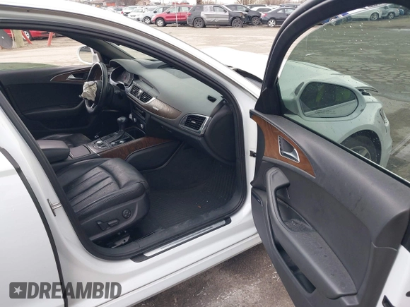 2014 Audi A6 Prestige z VIN WAUHMAFC6EN098487, wystawiony jako IAAI lot #41908034 z przebiegiem 146 298 mil mil oraz . Historia ofert i sprzedaży dostępna na DreamBid. Obrazek 5.
