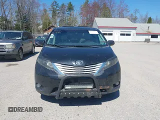 2011 Toyota Sienna XLE with VIN 5TDDK3DC8BS011975, listed as a IAAI auction lot 42112522 with 124,251 mi miles. Bid and sale history available at carsss.com. Image 12.