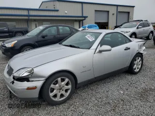 2000 Mercedes-Benz SLK 230 Kompressor с VIN WDBKK47F3YF157811, выставлен на аукционе Copart как лот 64007815 с пробегом 102 630 миль миль и Списание • Salvage title. История ставок и продаж доступна на DreamBid. Изображение 1.