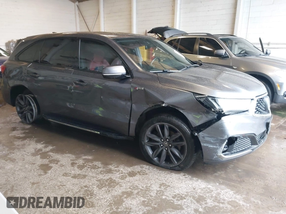 2019 Acura MDX Technology with VIN 5J8YD4H0XKL025557, listed as a IAAI auction lot 42365567 with 102,733 mi miles and . Bid and sale history available at DreamBid. Image 1.