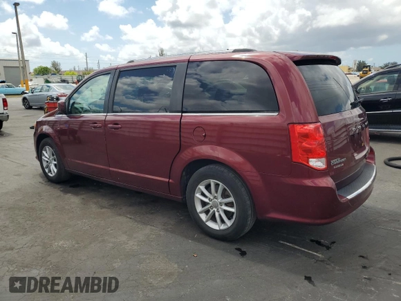 2019 Dodge Grand Caravan SXT with VIN 2C4RDGCGXKR807759, listed as a Copart auction lot 56098575 with 119,268 mi miles and Salvage Title. Bid and sale history available at DreamBid. Image 2.