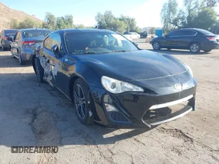 2015 Scion FR-S z VIN JF1ZNAA14F9703780, wystawiony jako IAAI lot #41493648 z przebiegiem 125 997 mil mil oraz . Historia ofert i sprzedaży dostępna na DreamBid. Obrazek 1.