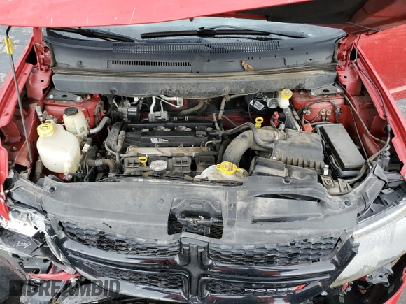 2019 Dodge Journey SE with VIN 3C4PDCBB1KT872339, listed as a Copart auction lot 61421265 with 77,157 mi miles and Salvage title. Bid and sale history available at DreamBid. Image 12.