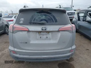 2016 Toyota RAV4 LE with VIN 2T3ZFREV4GW306588, listed as a IAAI auction lot 41686915 with 188,615 mi miles and . Bid and sale history available at DreamBid. Image 16.