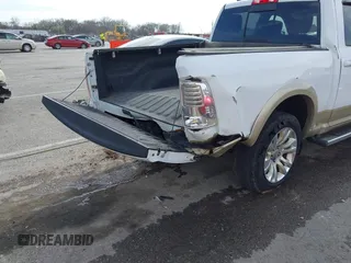 2014 Ram 1500 Longhorn Limited with VIN 1C6RR7PT9ES127063, listed as a IAAI auction lot 41817112 with 126,203 mi miles and . Bid and sale history available at DreamBid. Image 6.