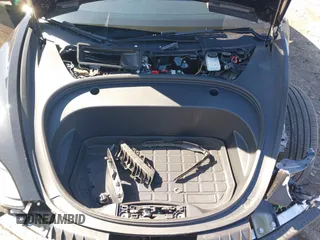 2023 Tesla Model 3 Long Range with VIN 5YJ3E1EB1PF632595, listed as a IAAI auction lot 41754131 with 8,147 mi miles and . Bid and sale history available at DreamBid. Image 10.
