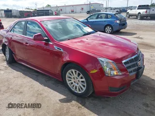 2011 Cadillac CTS z VIN 1G6DC5EY2B0143073, wystawiony jako IAAI lot #42322497 z przebiegiem 133 992 mil mil oraz . Historia ofert i sprzedaży dostępna na DreamBid. Obrazek 1.