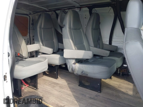 2011 Ford Econoline Cargo Commercial with VIN 1FTNE1EW5BDA33646, listed as a IAAI auction lot 41445228 with 120,594 mi miles and . Bid and sale history available at DreamBid. Image 8.