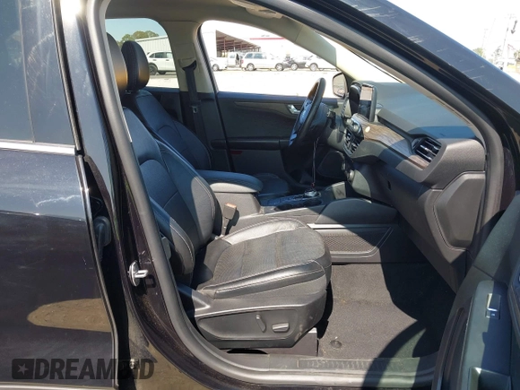 2020 Ford Escape Titanium z VIN 1FMCU9J97LUB18350, wystawiony jako IAAI lot #42574736 z przebiegiem 82 551 mil mil oraz . Historia ofert i sprzedaży dostępna na DreamBid. Obrazek 5.