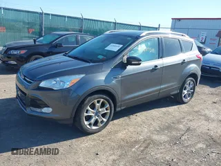 2015 Ford Escape Titanium with VIN 1FMCU9J9XFUB46843, listed as a IAAI auction lot 41800938 with 91,034 mi miles. Bid and sale history available at carsss.com. Image 17.