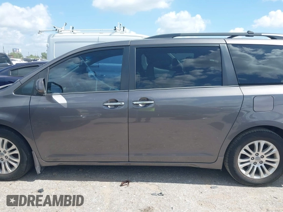 2014 Toyota Sienna XLE with VIN 5TDYK3DC0ES513076, listed as a IAAI auction lot 42724629 with 154,019 mi miles and . Bid and sale history available at DreamBid. Image 14.
