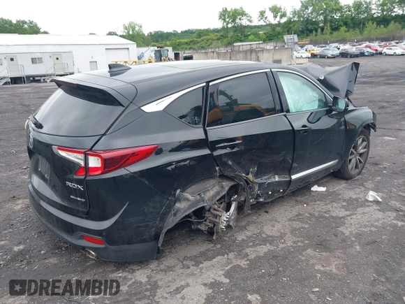 2019 Acura RDX Technology with VIN 5J8TC2H52KL030992, listed as a IAAI auction lot 42459982 with 77,042 mi miles and . Bid and sale history available at DreamBid. Image 4.
